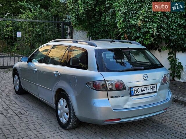 Сірий Мазда 6, об'ємом двигуна 2 л та пробігом 411 тис. км за 1950 $, фото 4 на Automoto.ua