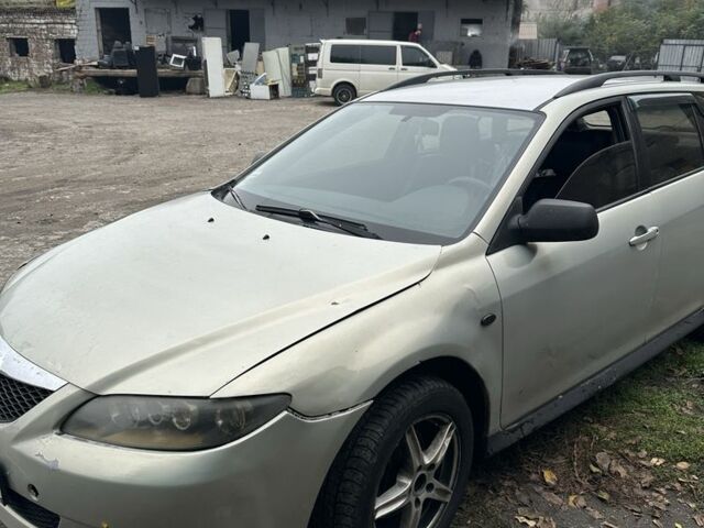 Серый Мазда 6, объемом двигателя 2 л и пробегом 400 тыс. км за 1898 $, фото 4 на Automoto.ua