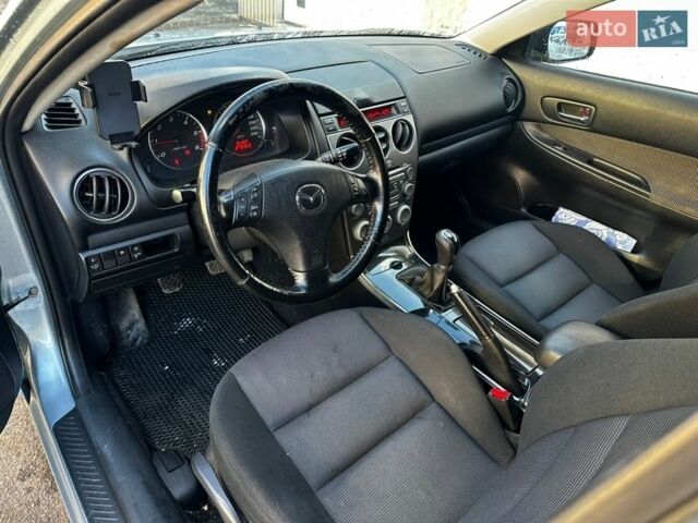 Сірий Мазда 6, об'ємом двигуна 2 л та пробігом 301 тис. км за 3550 $, фото 8 на Automoto.ua