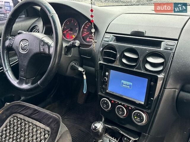 Сірий Мазда 6, об'ємом двигуна 2 л та пробігом 250 тис. км за 1399 $, фото 17 на Automoto.ua