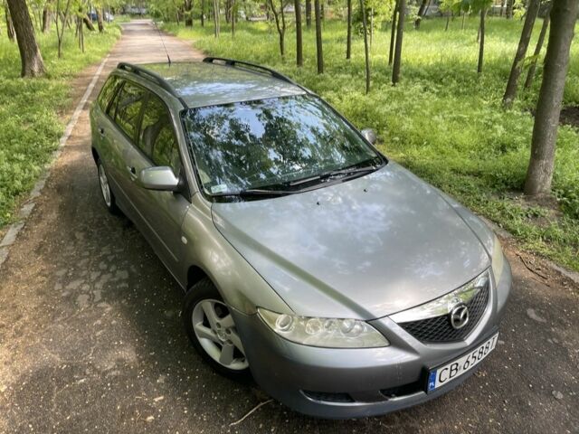 Серый Мазда 6, объемом двигателя 2 л и пробегом 350 тыс. км за 1550 $, фото 1 на Automoto.ua