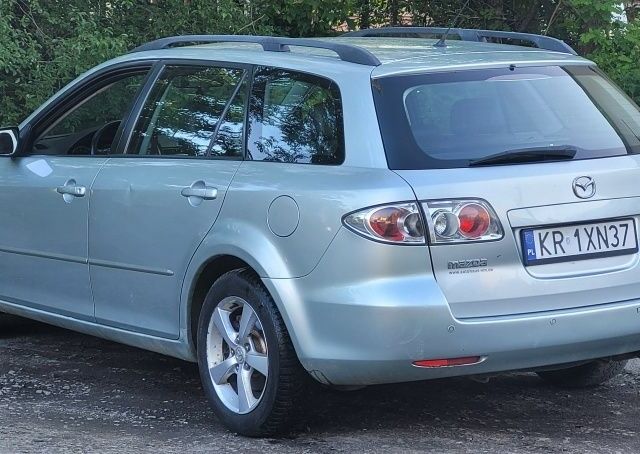 Сірий Мазда 6, об'ємом двигуна 2 л та пробігом 210 тис. км за 2450 $, фото 1 на Automoto.ua