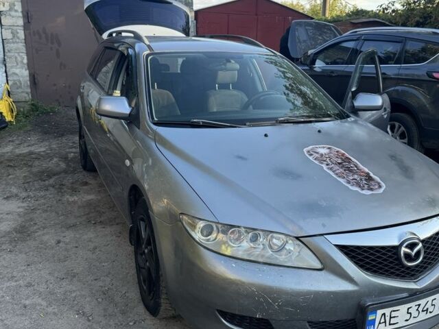 Серый Мазда 6, объемом двигателя 2 л и пробегом 389 тыс. км за 3310 $, фото 1 на Automoto.ua