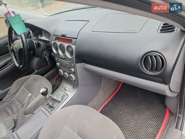 Серый Мазда 6, объемом двигателя 2 л и пробегом 441 тыс. км за 2900 $, фото 25 на Automoto.ua