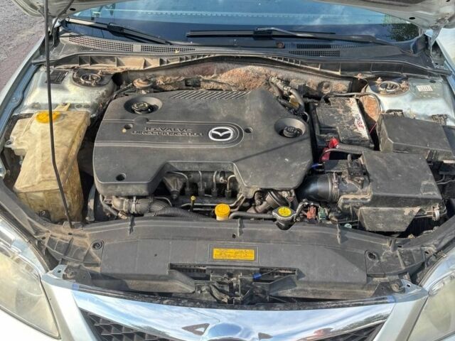 Серый Мазда 6, объемом двигателя 2 л и пробегом 344 тыс. км за 4000 $, фото 2 на Automoto.ua
