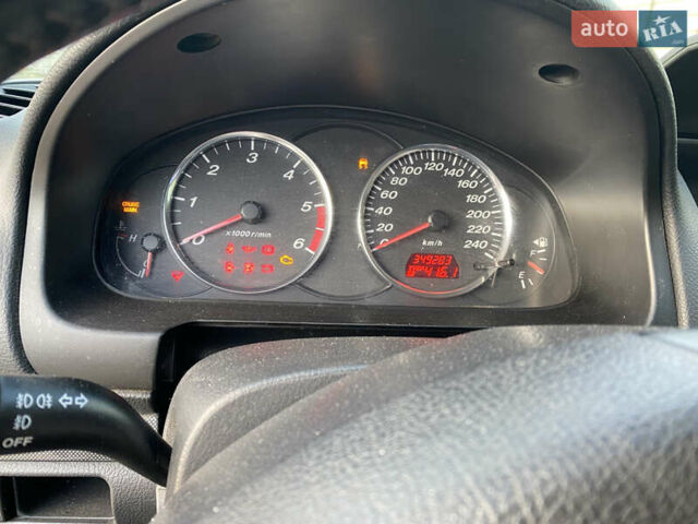 Сірий Мазда 6, об'ємом двигуна 2 л та пробігом 349 тис. км за 2300 $, фото 5 на Automoto.ua