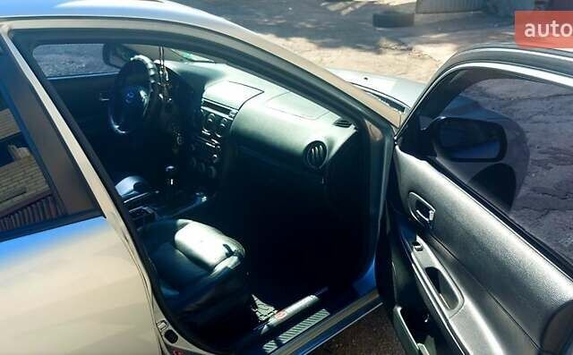 Сірий Мазда 6, об'ємом двигуна 2 л та пробігом 219 тис. км за 4500 $, фото 2 на Automoto.ua