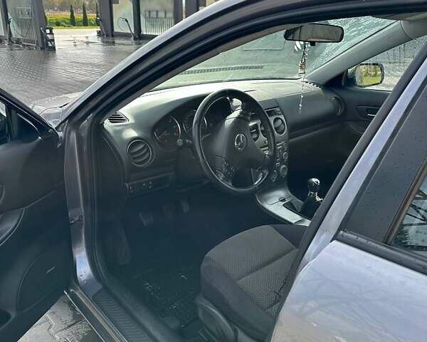 Серый Мазда 6, объемом двигателя 2 л и пробегом 260 тыс. км за 3900 $, фото 4 на Automoto.ua