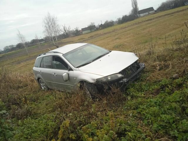 Серый Мазда 6, объемом двигателя 1.8 л и пробегом 200 тыс. км за 1111 $, фото 1 на Automoto.ua