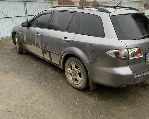 Сірий Мазда 6, об'ємом двигуна 2 л та пробігом 250 тис. км за 3100 $, фото 1 на Automoto.ua