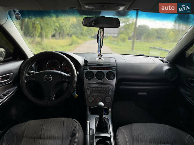Серый Мазда 6, объемом двигателя 2 л и пробегом 340 тыс. км за 2550 $, фото 6 на Automoto.ua