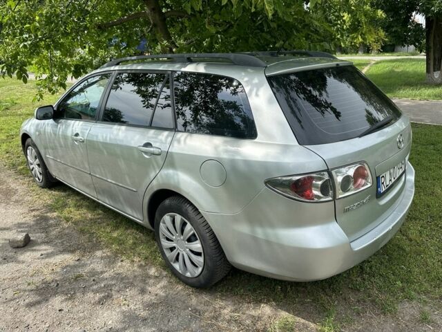 Серый Мазда 6, объемом двигателя 2 л и пробегом 300 тыс. км за 2350 $, фото 1 на Automoto.ua
