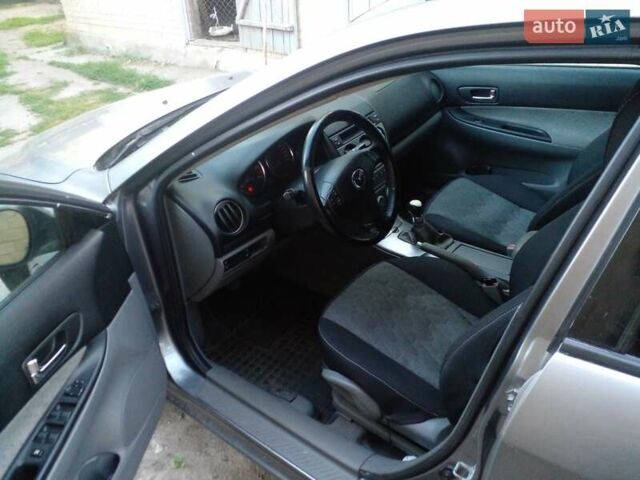Серый Мазда 6, объемом двигателя 2 л и пробегом 324 тыс. км за 5000 $, фото 2 на Automoto.ua