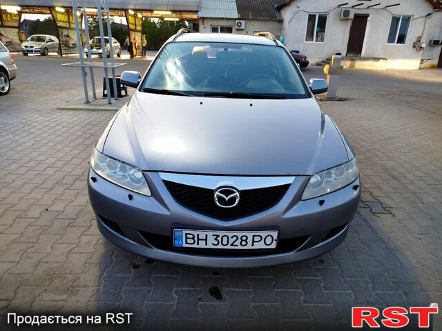 Серый Мазда 6, объемом двигателя 2 л и пробегом 250 тыс. км за 2850 $, фото 1 на Automoto.ua
