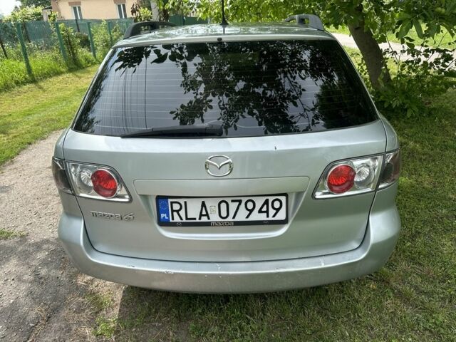 Серый Мазда 6, объемом двигателя 2 л и пробегом 300 тыс. км за 2350 $, фото 2 на Automoto.ua