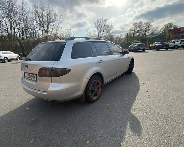 Сірий Мазда 6, об'ємом двигуна 2 л та пробігом 350 тис. км за 3400 $, фото 3 на Automoto.ua