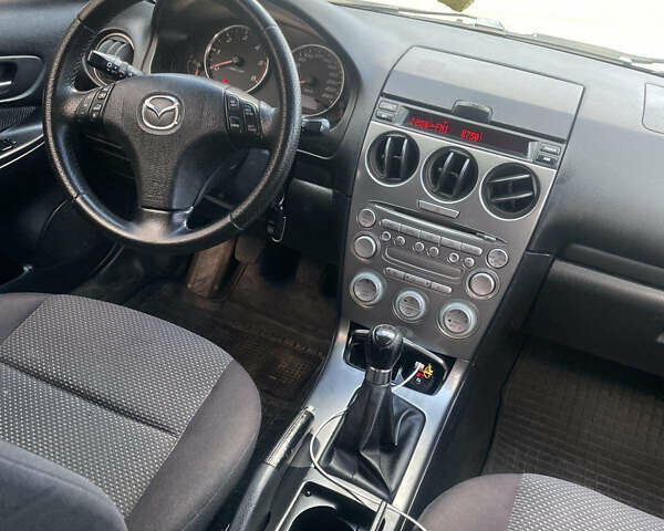 Сірий Мазда 6, об'ємом двигуна 2 л та пробігом 232 тис. км за 2900 $, фото 4 на Automoto.ua