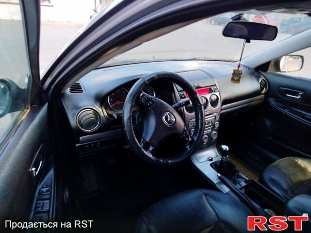 Серый Мазда 6, объемом двигателя 2 л и пробегом 250 тыс. км за 2850 $, фото 6 на Automoto.ua