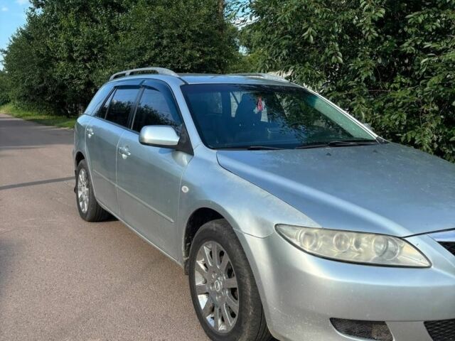 Серый Мазда 6, объемом двигателя 2 л и пробегом 344 тыс. км за 4000 $, фото 1 на Automoto.ua