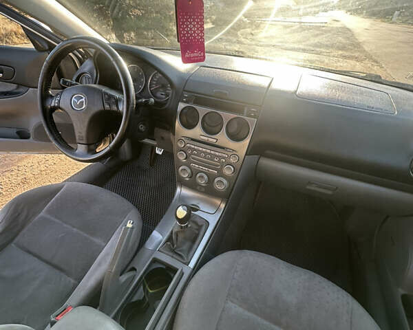 Сірий Мазда 6, об'ємом двигуна 2 л та пробігом 298 тис. км за 3400 $, фото 17 на Automoto.ua