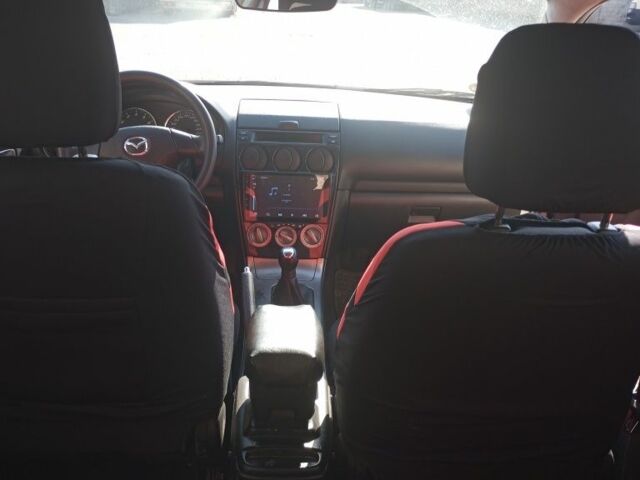 Серый Мазда 6, объемом двигателя 1.8 л и пробегом 229 тыс. км за 4200 $, фото 2 на Automoto.ua