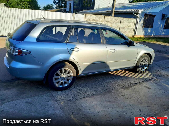 Серый Мазда 6, объемом двигателя 2 л и пробегом 344 тыс. км за 5100 $, фото 2 на Automoto.ua
