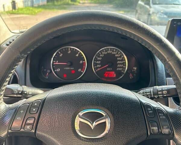 Серый Мазда 6, объемом двигателя 2 л и пробегом 348 тыс. км за 4000 $, фото 1 на Automoto.ua