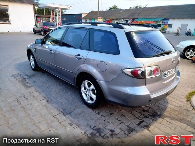 Серый Мазда 6, объемом двигателя 2 л и пробегом 250 тыс. км за 2850 $, фото 5 на Automoto.ua