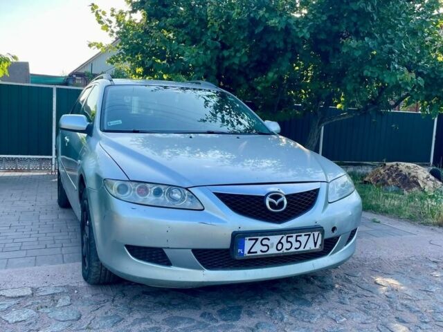 Серый Мазда 6, объемом двигателя 2 л и пробегом 300 тыс. км за 1850 $, фото 3 на Automoto.ua