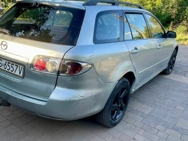 Серый Мазда 6, объемом двигателя 2 л и пробегом 300 тыс. км за 1850 $, фото 4 на Automoto.ua