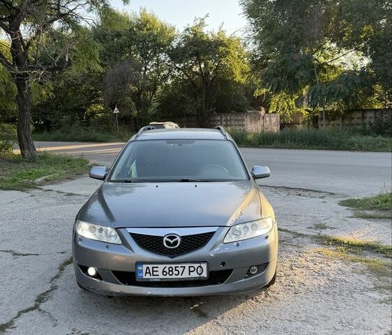 Серый Мазда 6, объемом двигателя 2 л и пробегом 235 тыс. км за 1749 $, фото 1 на Automoto.ua