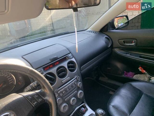 Серый Мазда 6, объемом двигателя 2 л и пробегом 294 тыс. км за 5500 $, фото 16 на Automoto.ua