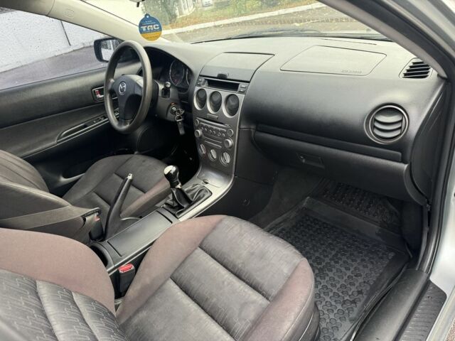 Серый Мазда 6, объемом двигателя 2 л и пробегом 290 тыс. км за 3600 $, фото 3 на Automoto.ua