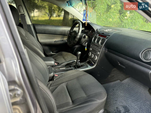 Серый Мазда 6, объемом двигателя 2 л и пробегом 340 тыс. км за 2550 $, фото 7 на Automoto.ua