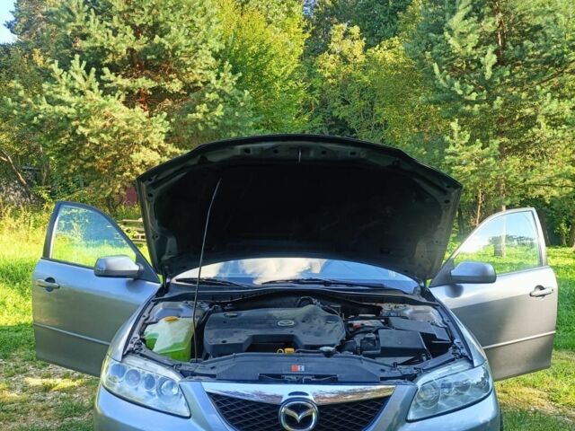 Серый Мазда 6, объемом двигателя 2 л и пробегом 260 тыс. км за 3900 $, фото 4 на Automoto.ua