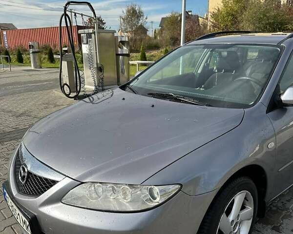 Серый Мазда 6, объемом двигателя 2 л и пробегом 260 тыс. км за 3900 $, фото 1 на Automoto.ua