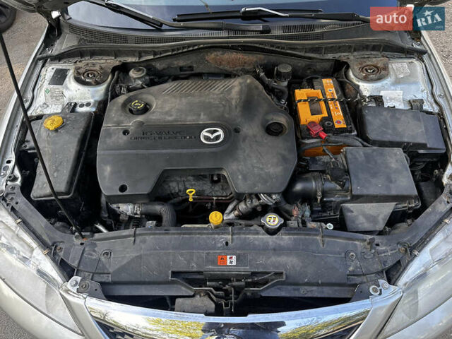 Сірий Мазда 6, об'ємом двигуна 2 л та пробігом 257 тис. км за 3950 $, фото 26 на Automoto.ua