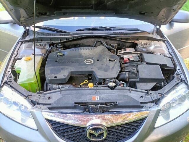 Серый Мазда 6, объемом двигателя 2 л и пробегом 260 тыс. км за 3900 $, фото 2 на Automoto.ua