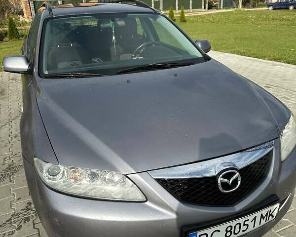 Серый Мазда 6, объемом двигателя 2 л и пробегом 260 тыс. км за 3900 $, фото 2 на Automoto.ua