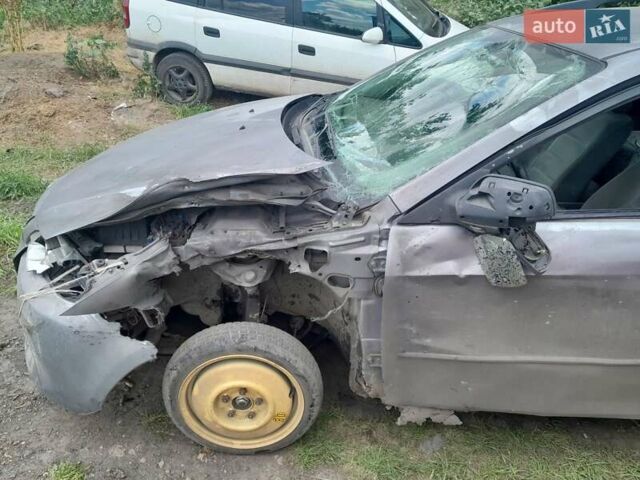 Серый Мазда 6, объемом двигателя 2 л и пробегом 250 тыс. км за 1700 $, фото 4 на Automoto.ua