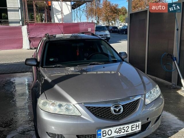 Сірий Мазда 6, об'ємом двигуна 2 л та пробігом 197 тис. км за 3500 $, фото 4 на Automoto.ua