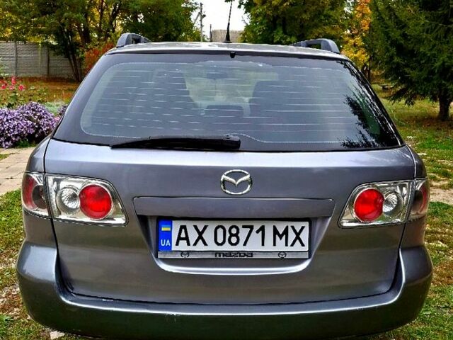 Серый Мазда 6, объемом двигателя 2 л и пробегом 510 тыс. км за 3700 $, фото 2 на Automoto.ua