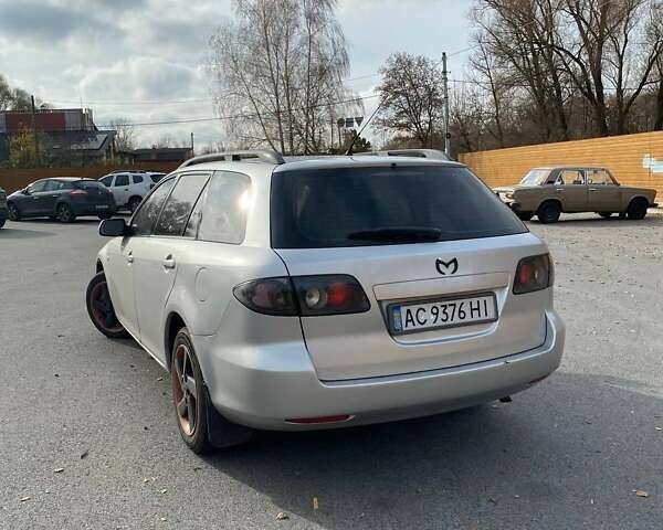 Сірий Мазда 6, об'ємом двигуна 2 л та пробігом 350 тис. км за 3300 $, фото 4 на Automoto.ua