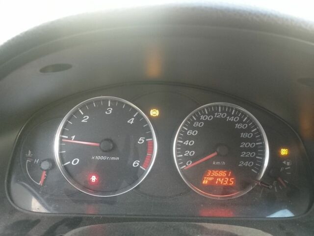 Серый Мазда 6, объемом двигателя 2 л и пробегом 336 тыс. км за 3600 $, фото 2 на Automoto.ua