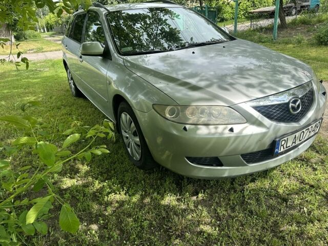 Серый Мазда 6, объемом двигателя 2 л и пробегом 300 тыс. км за 2350 $, фото 4 на Automoto.ua