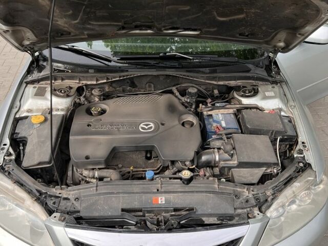 Серый Мазда 6, объемом двигателя 2 л и пробегом 285 тыс. км за 3100 $, фото 2 на Automoto.ua