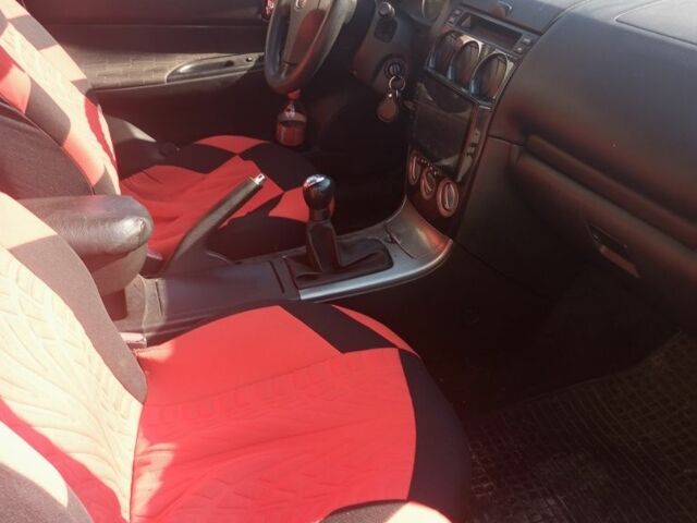 Серый Мазда 6, объемом двигателя 1.8 л и пробегом 229 тыс. км за 4200 $, фото 4 на Automoto.ua