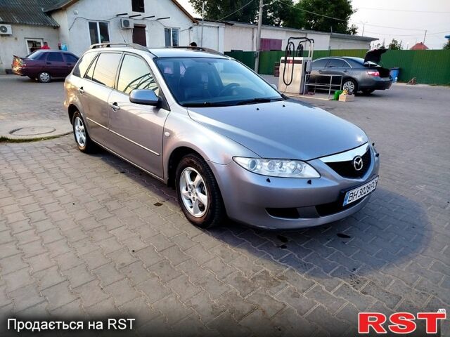 Серый Мазда 6, объемом двигателя 2 л и пробегом 250 тыс. км за 2850 $, фото 2 на Automoto.ua