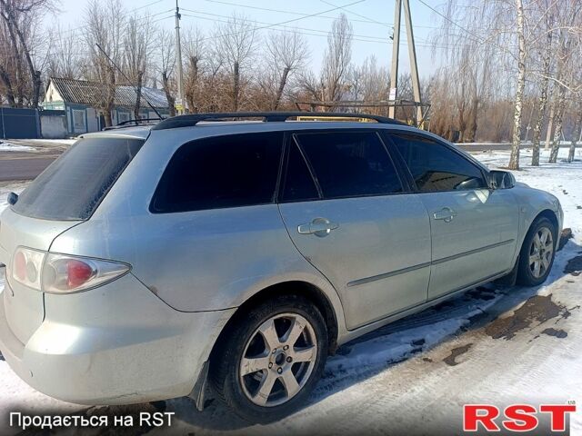 Серый Мазда 6, объемом двигателя 2 л и пробегом 330 тыс. км за 3990 $, фото 2 на Automoto.ua