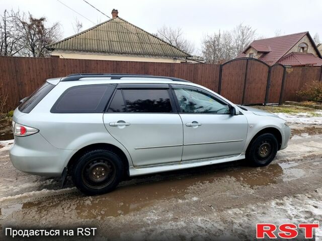 Серый Мазда 6, объемом двигателя 2 л и пробегом 275 тыс. км за 3499 $, фото 1 на Automoto.ua